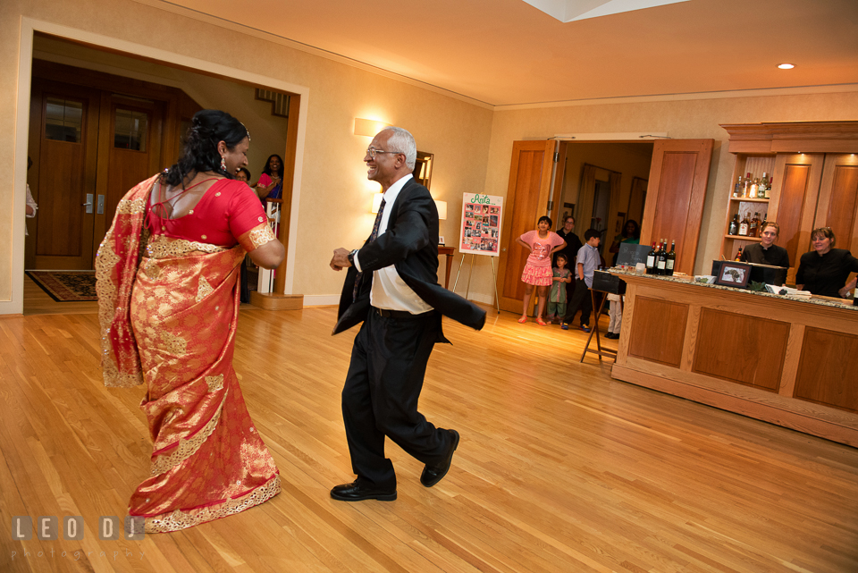 Bride and her Father dancing energetically during parent dance. Aspen Wye River Conference Centers wedding at Queenstown Maryland, by wedding photographers of Leo Dj Photography. http://leodjphoto.com