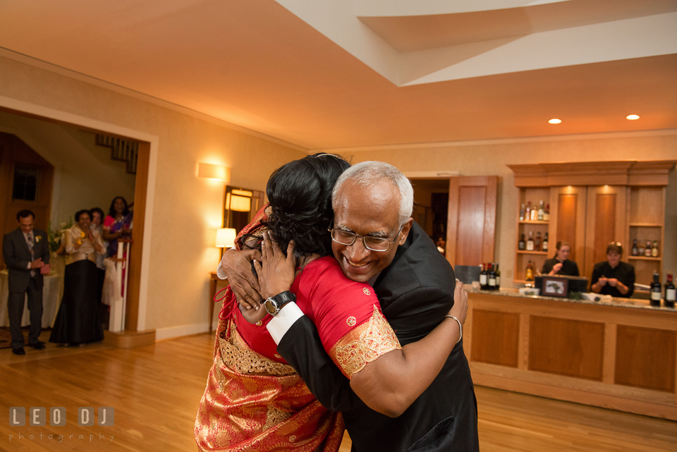 Father of the Bride and daugther hugging after the parent dance. Aspen Wye River Conference Centers wedding at Queenstown Maryland, by wedding photographers of Leo Dj Photography. http://leodjphoto.com