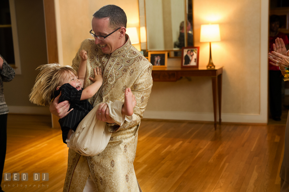 Groom lifted up one boy and swing him around during parent dance with Mother of the Groom. Aspen Wye River Conference Centers wedding at Queenstown Maryland, by wedding photographers of Leo Dj Photography. http://leodjphoto.com