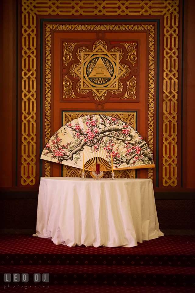 Unity candles and Chinese fan at the altar in the Oriental Room. Tremont Grand Historic Venue wedding, Baltimore, Maryland, by wedding photographers of Leo Dj Photography. http://leodjphoto.com