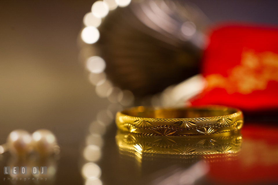 Detail close up shot of Bride's golden bracelet. Tremont Grand Historic Venue wedding, Baltimore, Maryland, by wedding photographers of Leo Dj Photography. http://leodjphoto.com