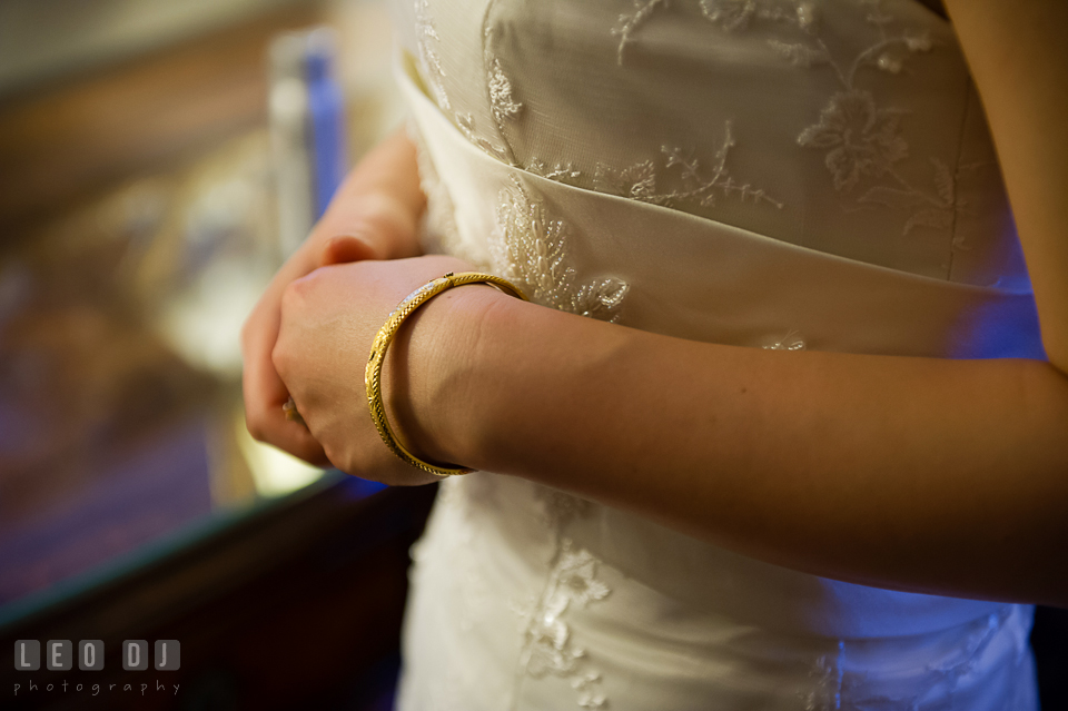 Bride wearing her golden bracelet. Tremont Grand Historic Venue wedding, Baltimore, Maryland, by wedding photographers of Leo Dj Photography. http://leodjphoto.com