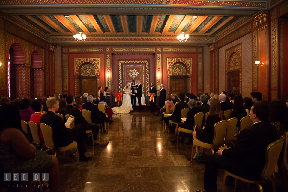 Bride and Groom during the ceremony by the altar in the Oriental Room. Tremont Grand Historic Venue wedding, Baltimore, Maryland, by wedding photographers of Leo Dj Photography. http://leodjphoto.com