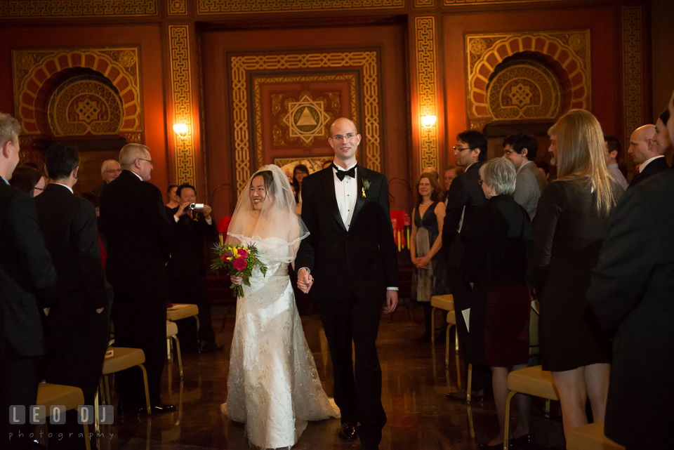 Bride and Groom walking out of the aisle during reception. Tremont Grand Historic Venue wedding, Baltimore, Maryland, by wedding photographers of Leo Dj Photography. http://leodjphoto.com