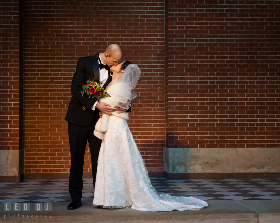 Bride and Groom kissing during a romantic portrait session. Tremont Grand Historic Venue wedding, Baltimore, Maryland, by wedding photographers of Leo Dj Photography. http://leodjphoto.com