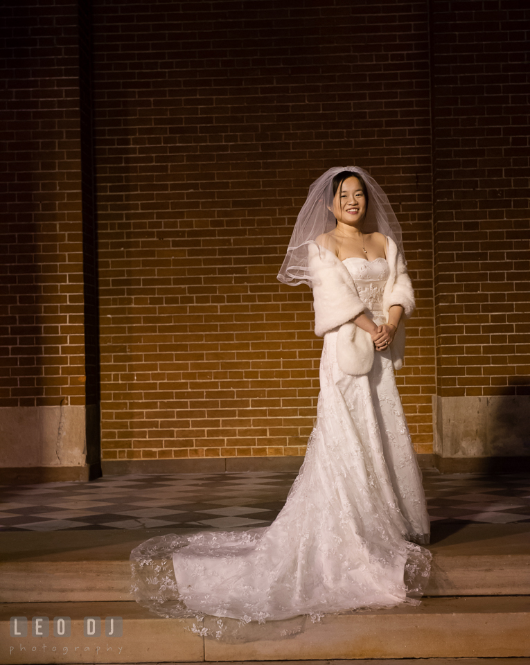 Bride posing and smiling with her beautiful wedding gown. Tremont Grand Historic Venue wedding, Baltimore, Maryland, by wedding photographers of Leo Dj Photography. http://leodjphoto.com