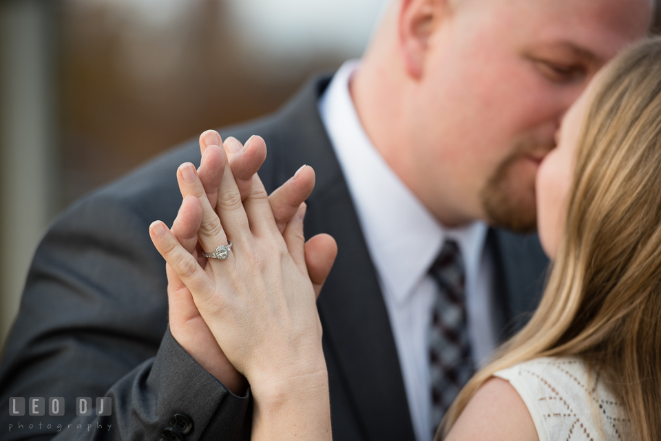 Downtown Annapolis Maryland engaged couple holding hands showing engagement ring photo by Leo Dj Photography.