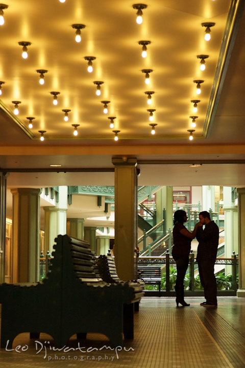 Engaged guy kissed his fiancée's hand. Pre wedding engagement photo session at Georgetown, Washington DC by wedding photographer Leo Dj Photography