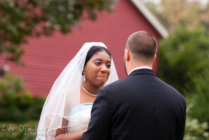 Bride emotional seeing groom the first time. Kitty Knight House Georgetown Maryland wedding photos by photographers of Leo Dj Photography.