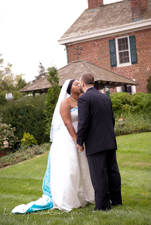 Bride and groom kissed after first glance. Kitty Knight House Georgetown Maryland wedding photos by photographers of Leo Dj Photography.