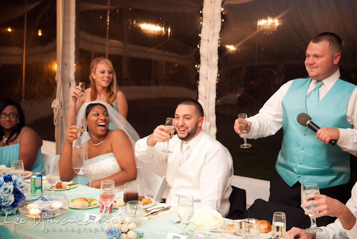 Champange toast. Bride, groom and bridal party laughing. Kitty Knight House Georgetown Maryland wedding photos by photographers of Leo Dj Photography.