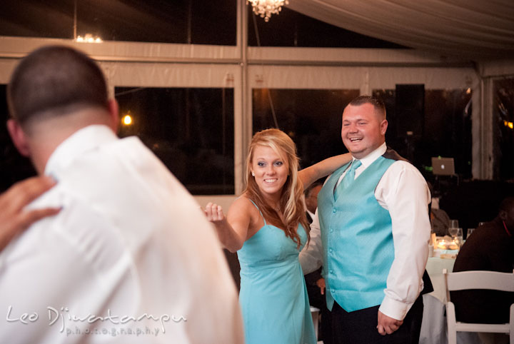 Matron of honor and best man dancing, laughing. Kitty Knight House Georgetown Maryland wedding photos by photographers of Leo Dj Photography.