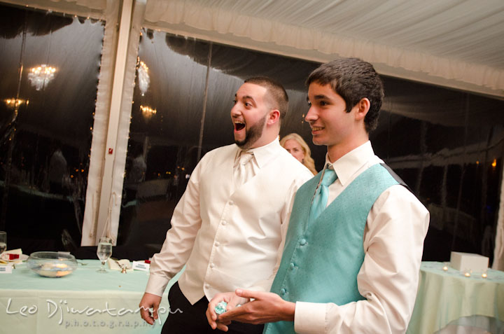Groom and brother amazed and laughing. Kitty Knight House Georgetown Maryland wedding photos by photographers of Leo Dj Photography.
