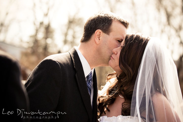 father of the bride kissed daughter, letting her go. Clifton Inn Charlottesville VA Destination Wedding Photographer