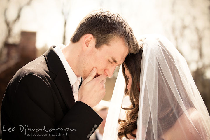 groom and bride having an emotional moment, praying together. Clifton Inn Charlottesville VA Destination Wedding Photographer