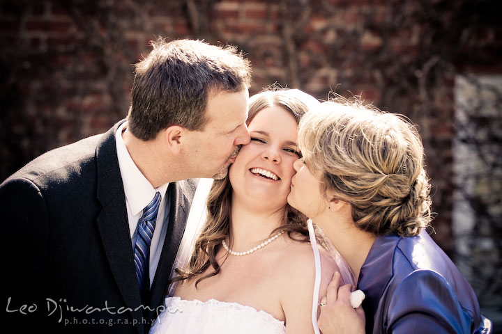 bride gets kiss from her parents, father and mother. Clifton Inn Charlottesville VA Destination Wedding Photographer