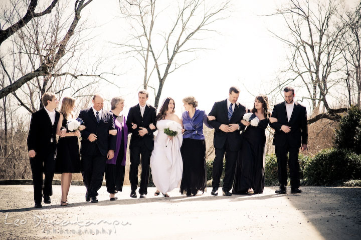 Bride, groom, maid of honor, bridesmaid, best man, groomsman, and parents walking together. Clifton Inn Charlottesville VA Destination Wedding Photographer