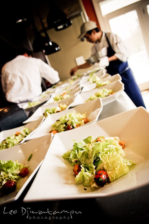 chef and kitchen staff preparing food, salad for the wedding party. Clifton Inn Charlottesville VA Destination Wedding Photographer