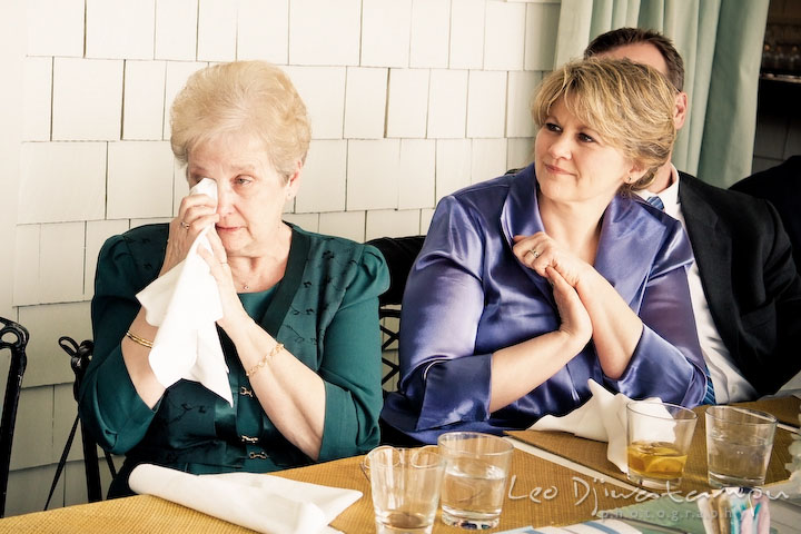 grandmother and mother of bride listening to best man and maid of honor's speech. getting emotional. Clifton Inn Charlottesville VA Destination Wedding Photographer