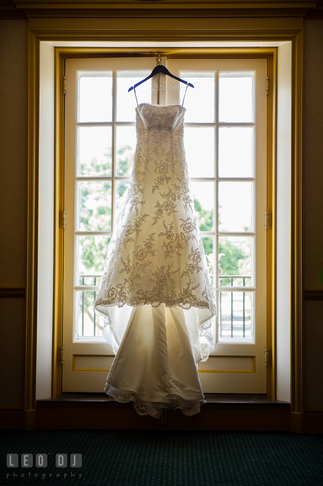 Bride's beautiful wedding dress by Mon Cheri. Aspen Wye River Conference Centers wedding at Queenstown Maryland, by wedding photographers of Leo Dj Photography. http://leodjphoto.com