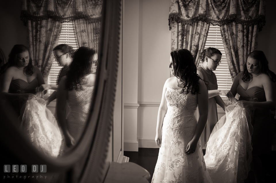 The Bride looking at her reflection in the mirror. Aspen Wye River Conference Centers wedding at Queenstown Maryland, by wedding photographers of Leo Dj Photography. http://leodjphoto.com