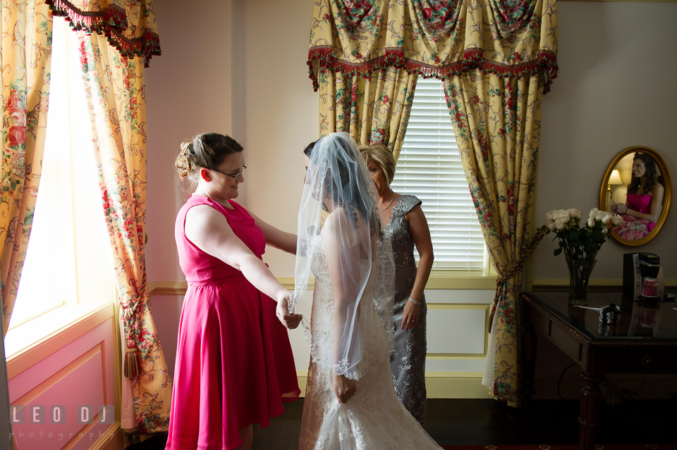 The Bride embraced by her sister. Aspen Wye River Conference Centers wedding at Queenstown Maryland, by wedding photographers of Leo Dj Photography. http://leodjphoto.com