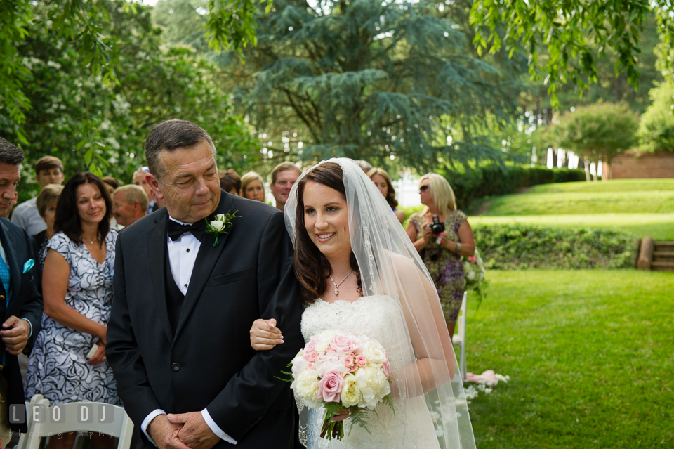 The Bride with her father walking down the aisle. Aspen Wye River Conference Centers wedding at Queenstown Maryland, by wedding photographers of Leo Dj Photography. http://leodjphoto.com