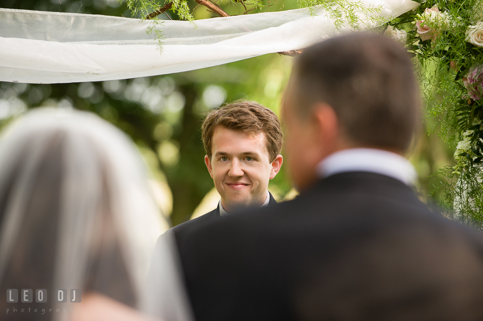 The Groom eyeing his beautiful Bride as she approaches. Aspen Wye River Conference Centers wedding at Queenstown Maryland, by wedding photographers of Leo Dj Photography. http://leodjphoto.com