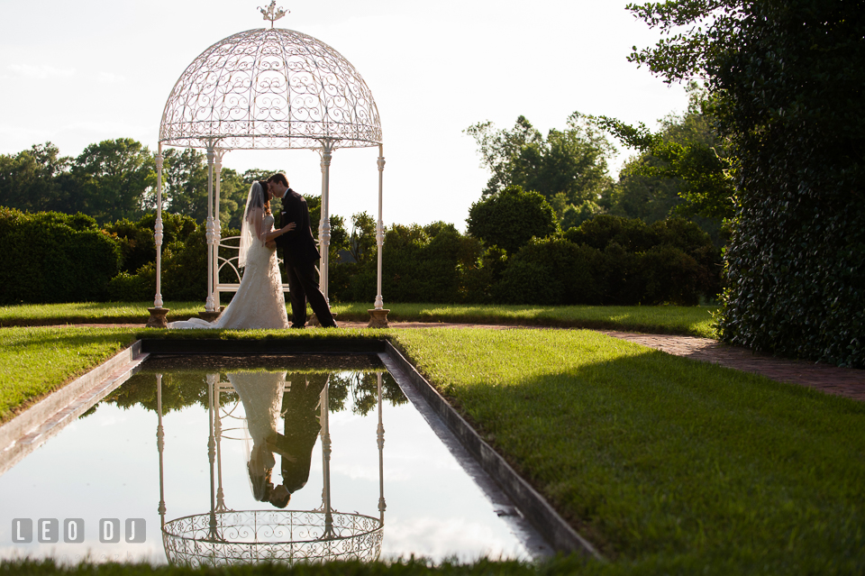 The Bride and Groom kissing under the gazebo. Aspen Wye River Conference Centers wedding at Queenstown Maryland, by wedding photographers of Leo Dj Photography. http://leodjphoto.com