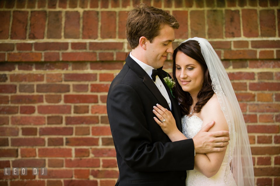 The Bride and Groom hugging. Aspen Wye River Conference Centers wedding at Queenstown Maryland, by wedding photographers of Leo Dj Photography. http://leodjphoto.com