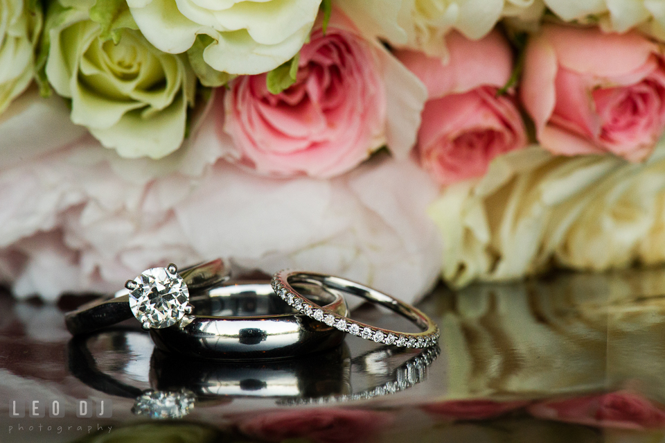 Close up shot of wedding bands and diamond engagement ring. Aspen Wye River Conference Centers wedding at Queenstown Maryland, by wedding photographers of Leo Dj Photography. http://leodjphoto.com