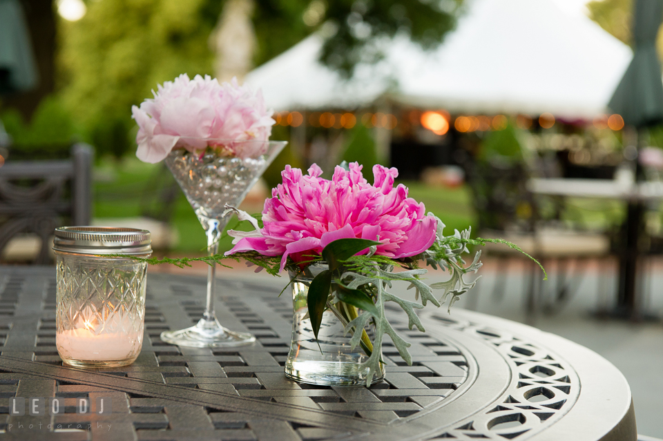 Candle and flowers for table decor during cocktail hour. Aspen Wye River Conference Centers wedding at Queenstown Maryland, by wedding photographers of Leo Dj Photography. http://leodjphoto.com