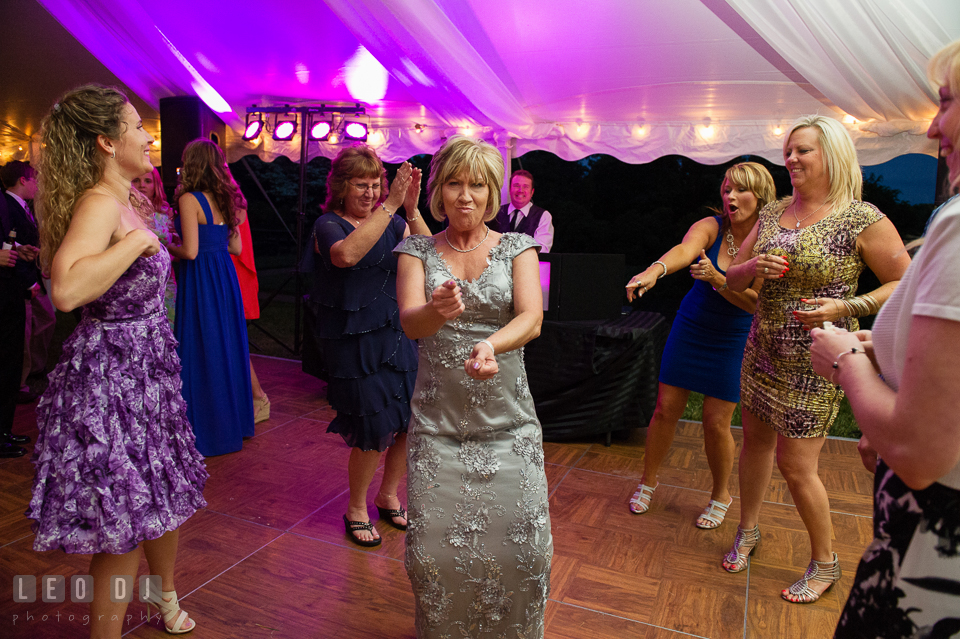 Mother of the Bride silly dancing at the wedding reception. Aspen Wye River Conference Centers wedding at Queenstown Maryland, by wedding photographers of Leo Dj Photography. http://leodjphoto.com