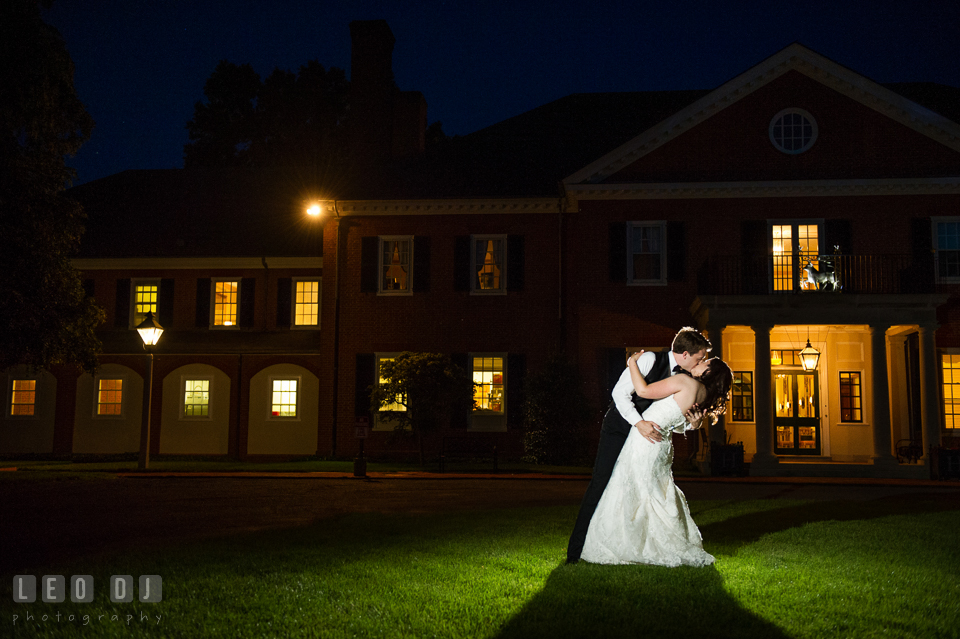 Groom doing the dip and kissing the Bride after the wedding reception. Aspen Wye River Conference Centers wedding at Queenstown Maryland, by wedding photographers of Leo Dj Photography. http://leodjphoto.com