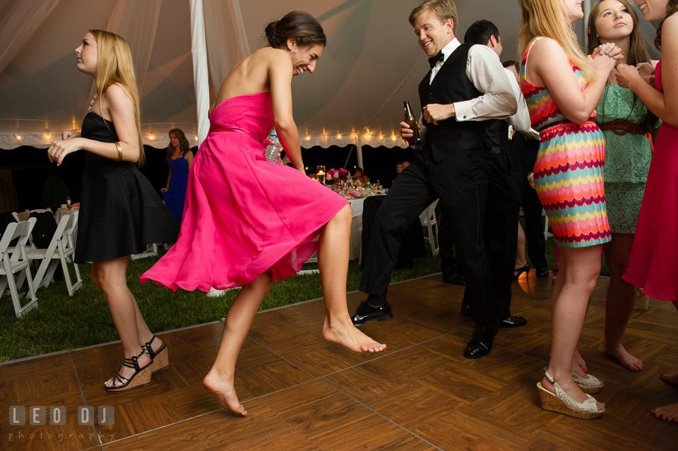 Best man and bridesmaid dancing dancing and jumping during the wedding reception. Aspen Wye River Conference Centers wedding at Queenstown Maryland, by wedding photographers of Leo Dj Photography. http://leodjphoto.com