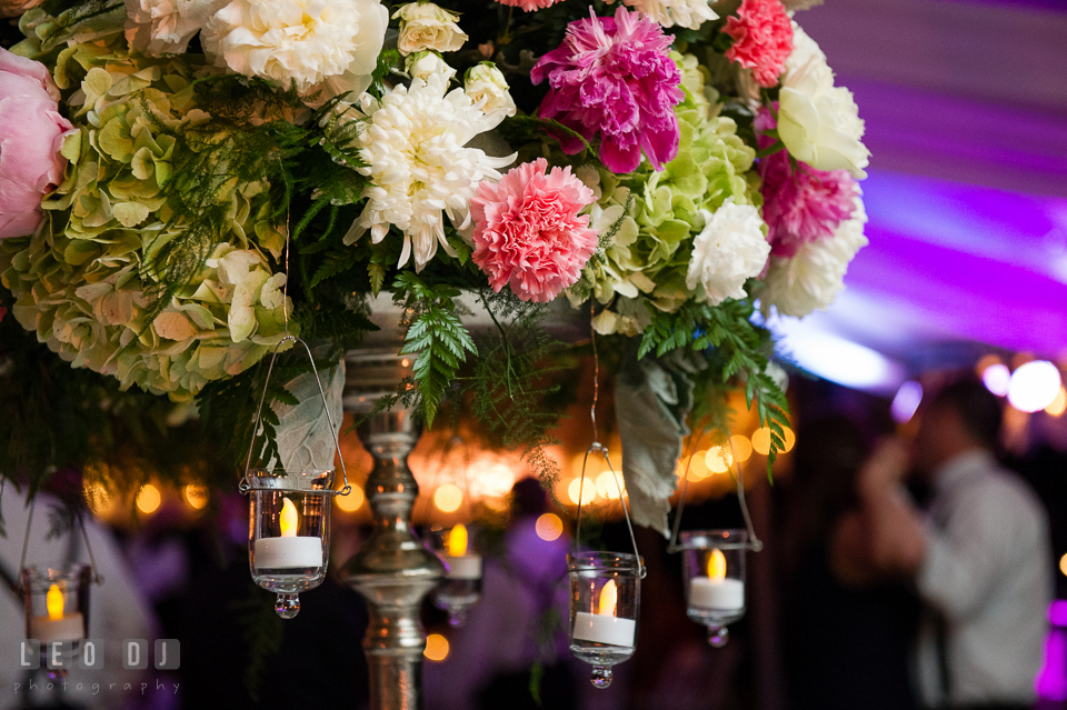 Hanging candles among the flower arrangements. Aspen Wye River Conference Centers wedding at Queenstown Maryland, by wedding photographers of Leo Dj Photography. http://leodjphoto.com