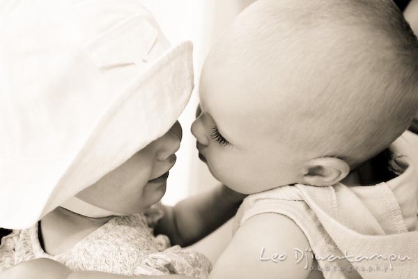 hallmark card moment, boy wants to kiss girl. baby toddler children candid photography annapolis kent island eastern shore maryland