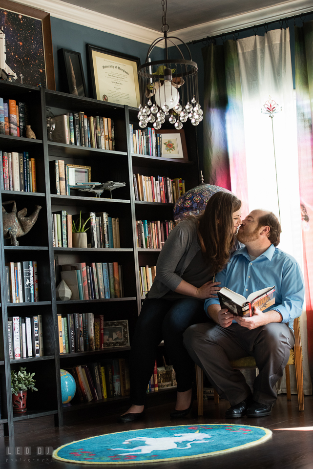 Home Residence Baltimore Maryland engaged girl almost kissed fiancé in library photo by Leo Dj Photography.