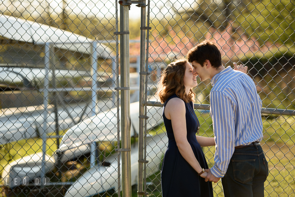 Baltimore Rowing Club Maryland engaged girl almost kiss her fiance photo by Leo Dj Photography.