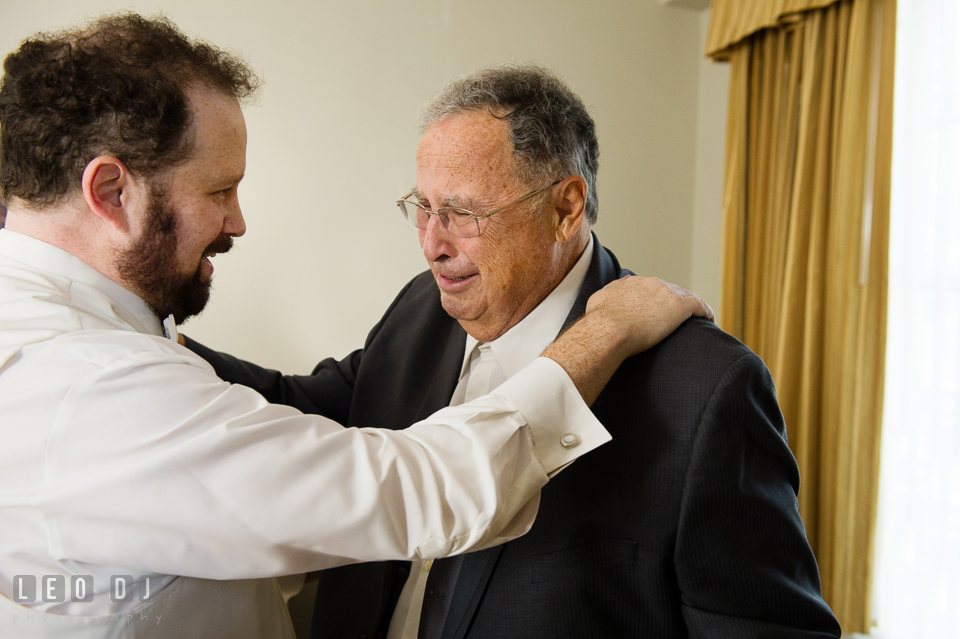 Groom and Father having a tender moment during getting ready. The Tidewater Inn wedding, Easton, Eastern Shore, Maryland, by wedding photographers of Leo Dj Photography. http://leodjphoto.com