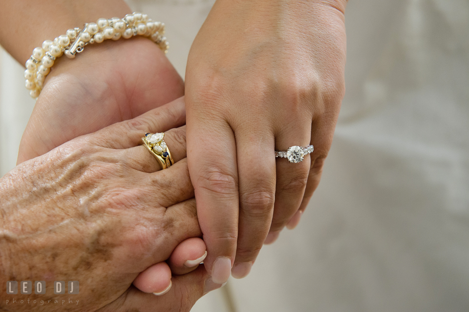 Bride holding her Mother's hand, both showing their beautiful engagement rings. The Tidewater Inn wedding, Easton, Eastern Shore, Maryland, by wedding photographers of Leo Dj Photography. http://leodjphoto.com