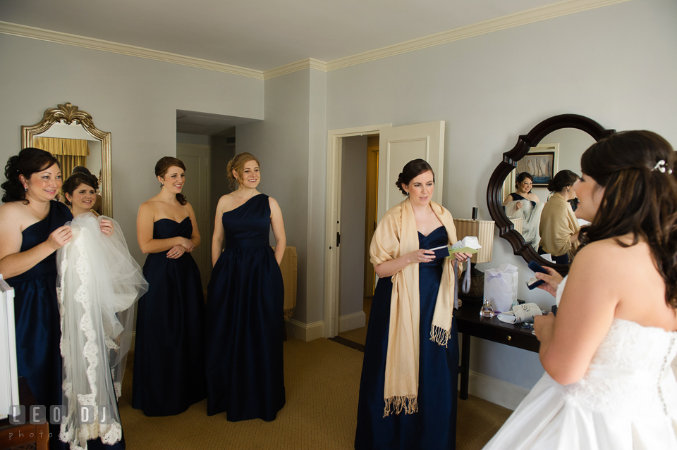 Maid of Honor and the Bridesmaids in awe looking at the Bride in her wedding dress. The Tidewater Inn wedding, Easton, Eastern Shore, Maryland, by wedding photographers of Leo Dj Photography. http://leodjphoto.com