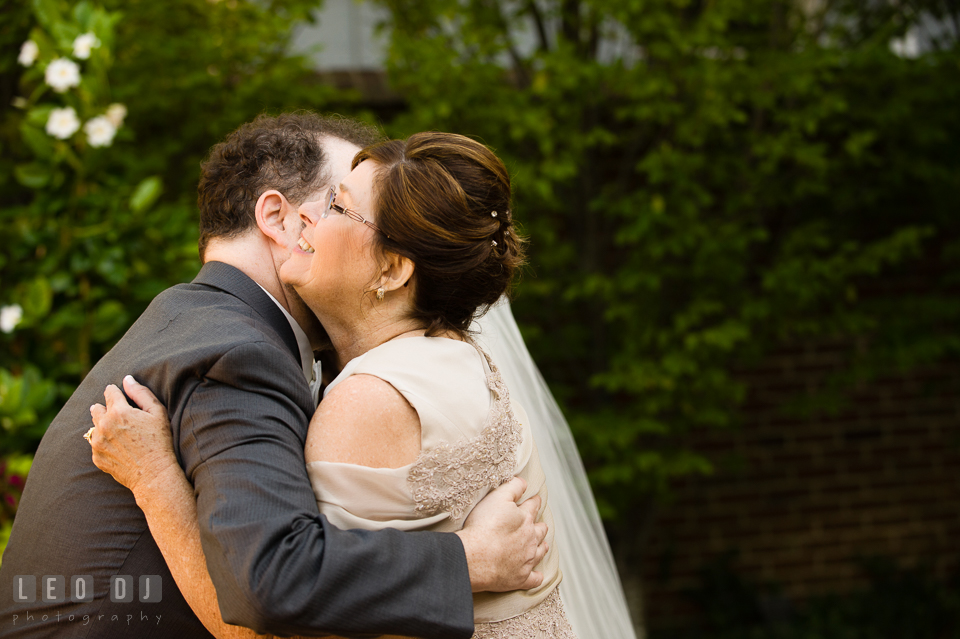 Mother of the Bride hugging Groom after the first glance. The Tidewater Inn wedding, Easton, Eastern Shore, Maryland, by wedding photographers of Leo Dj Photography. http://leodjphoto.com