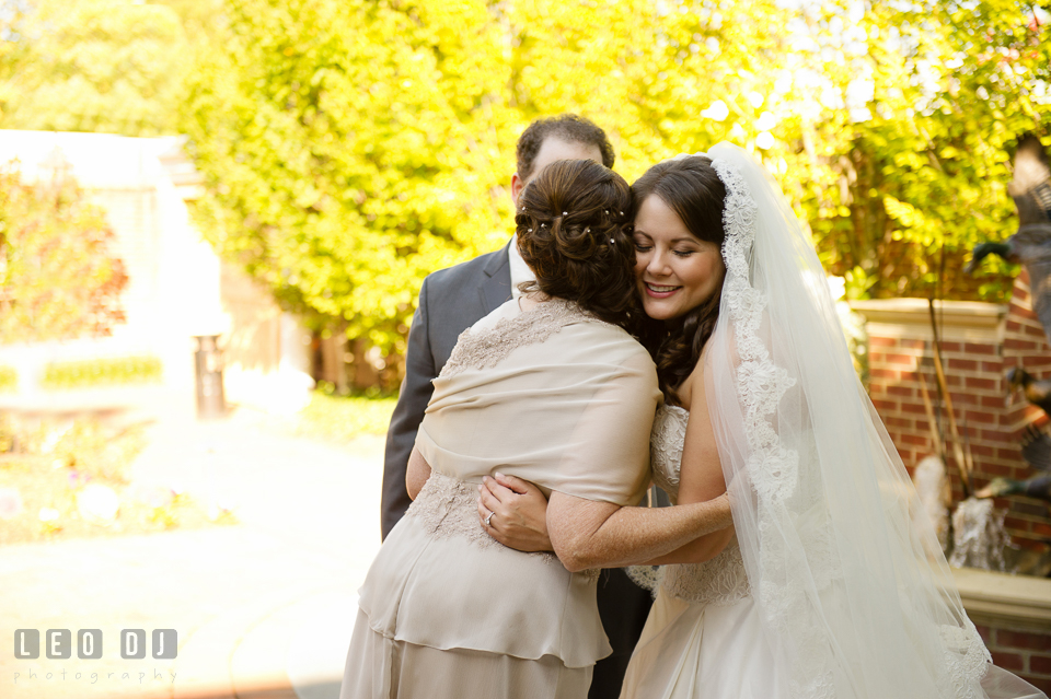 Mother of the Bride hugging her daughter after the first look. The Tidewater Inn wedding, Easton, Eastern Shore, Maryland, by wedding photographers of Leo Dj Photography. http://leodjphoto.com