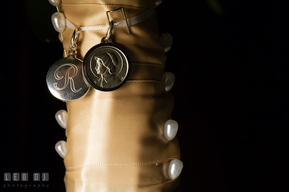 Detail shot of bridal bouquet with personalized charms. The Tidewater Inn wedding, Easton, Eastern Shore, Maryland, by wedding photographers of Leo Dj Photography. http://leodjphoto.com