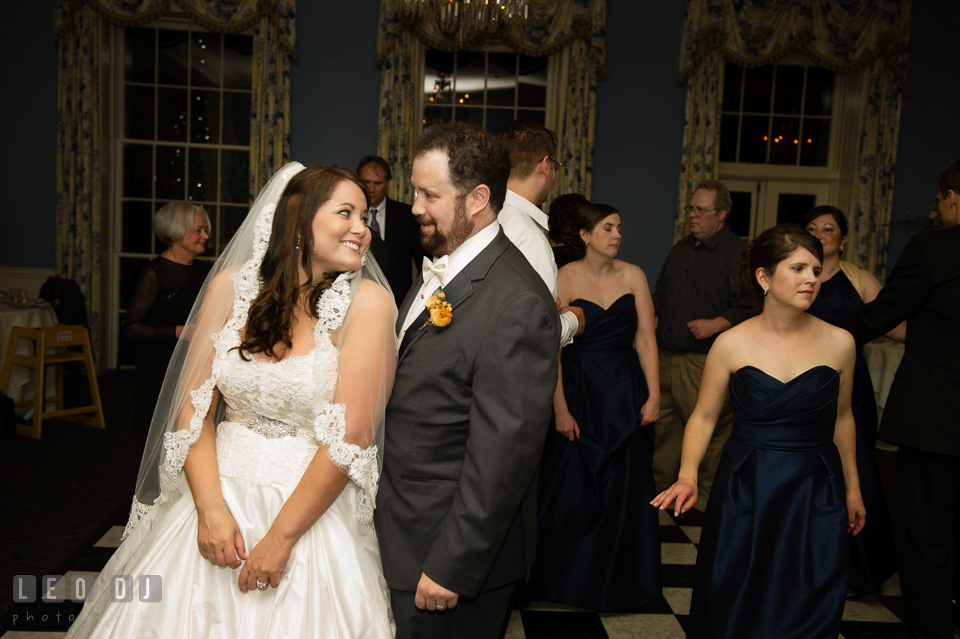 Bride and Groom smiling toward each other during open dance floor. The Tidewater Inn wedding, Easton, Eastern Shore, Maryland, by wedding photographers of Leo Dj Photography. http://leodjphoto.com