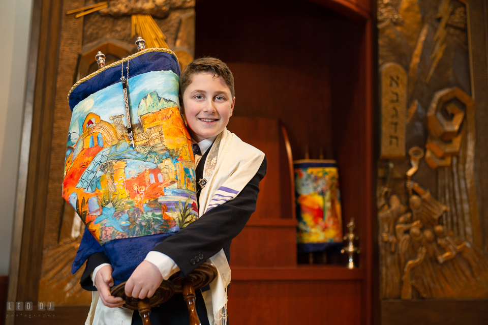 Temple Beth Shalom Annpolis Maryland bar mitzvah boy carrying Torah photo by Leo Dj Photography.