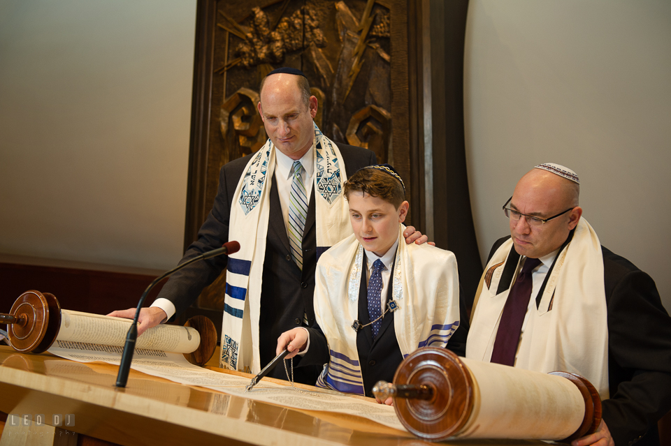 Temple Beth Shalom Annpolis Maryland bar mitzvah boy reading Torah with rabbi and cantor photo by Leo Dj Photography.