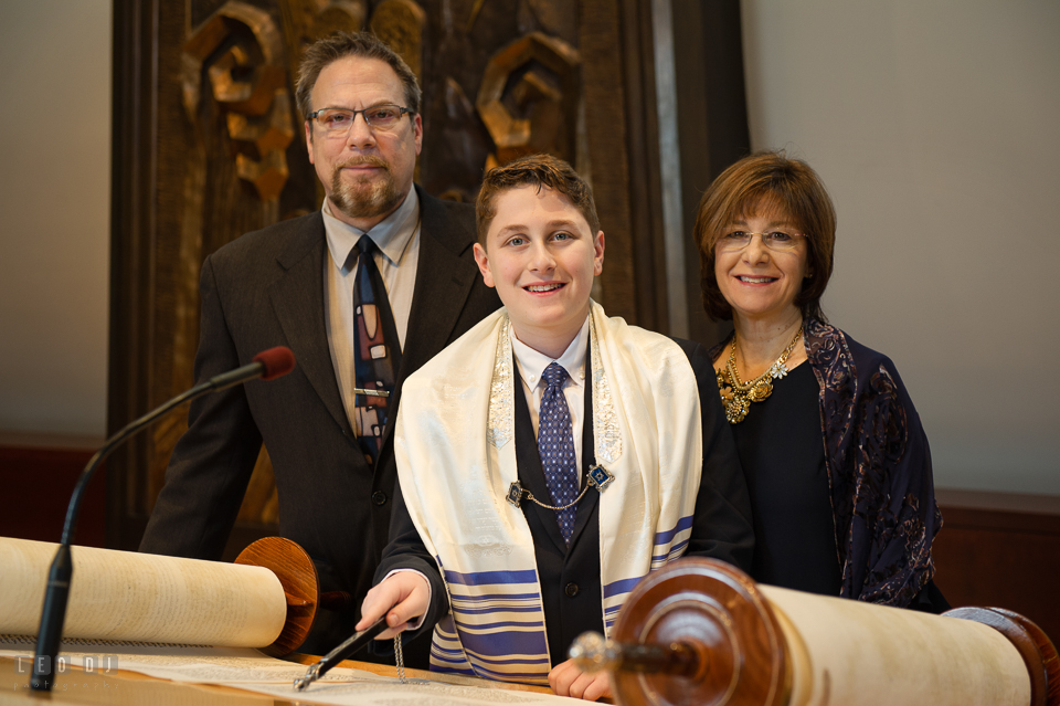 Temple Beth Shalom Annpolis Maryland bar mitzvah boy posing with Mother and Father by Torah photo by Leo Dj Photography.