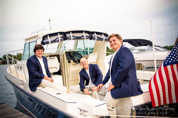 groom best man groomsman on boat annapolis kent island maryland wedding photography photographers
